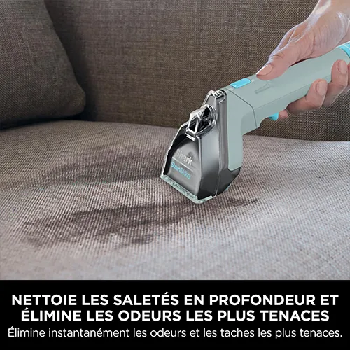 Shampouineuse Shark PX200EUCP en action sur un canapé, élimine efficacement les taches et les mauvaises odeurs