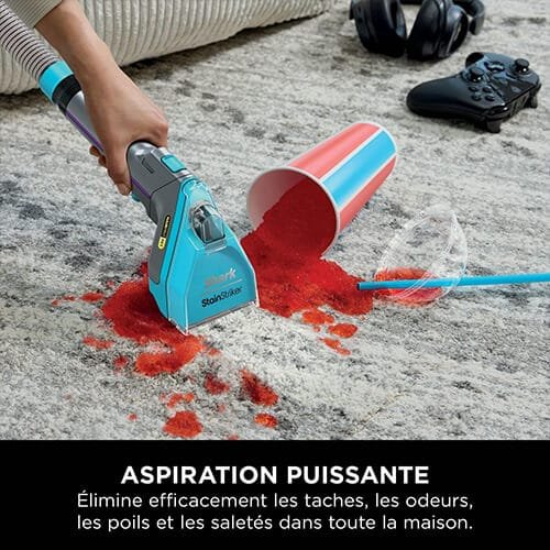 Shampouineuse Shark PX250EUT aspirant un liquide rouge renversé sur un tapis avec puissance pour éliminer les taches et saletés